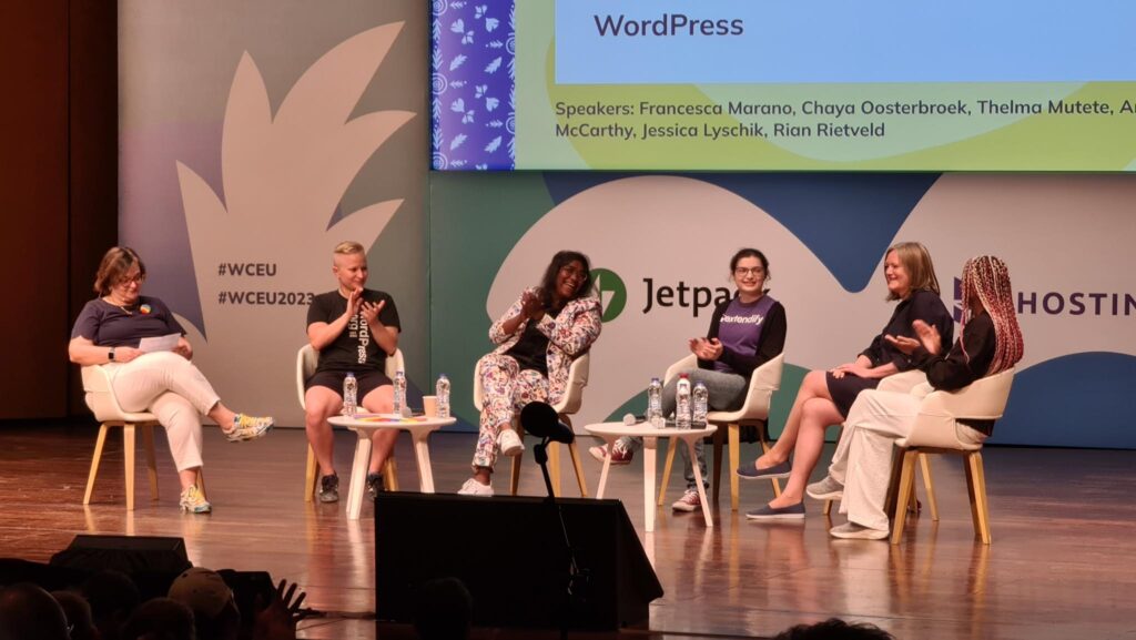 Rian on stage during the panel 'Women and non-binary folx of WordPress'