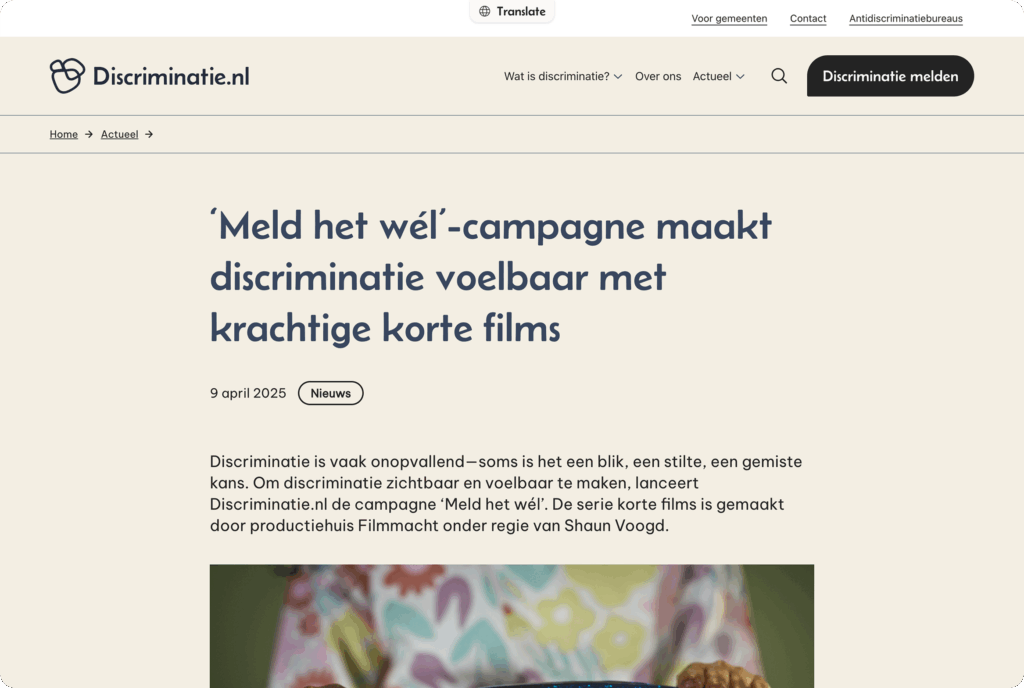 Desktop screenshot. Een nieuwsartikel met de titel "'Meld het wél' -campagne maakt discriminatie voelbaar met krachtige korte films".
